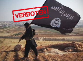 Mann mit IS-Flagge. Darüber das Wort „Verboten“.