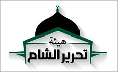 Ein Banner der Organisation HTS mit einer Moschee.